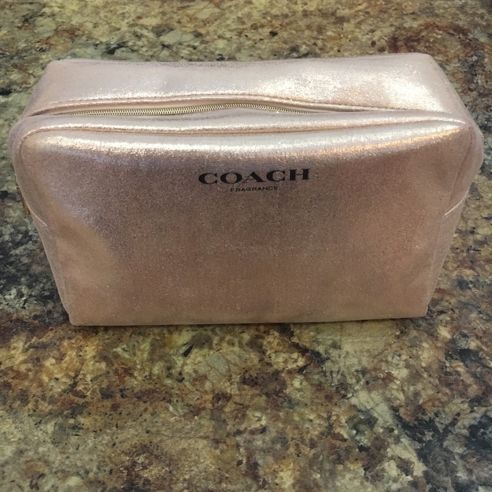 Pink sparkly Coach makeup bag